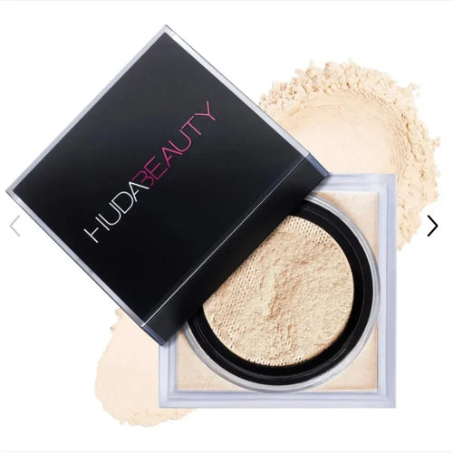 Huda Beauty Powder – transparentny puder utrwalający makijaż, kontrola sebum